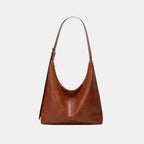 Orange leather minimalist shoulder bag